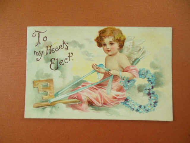 Image for To My Heart's Elect Cupid Flying on a Key Blue Foral Wreath 1910 Medina, Seville, Ohio