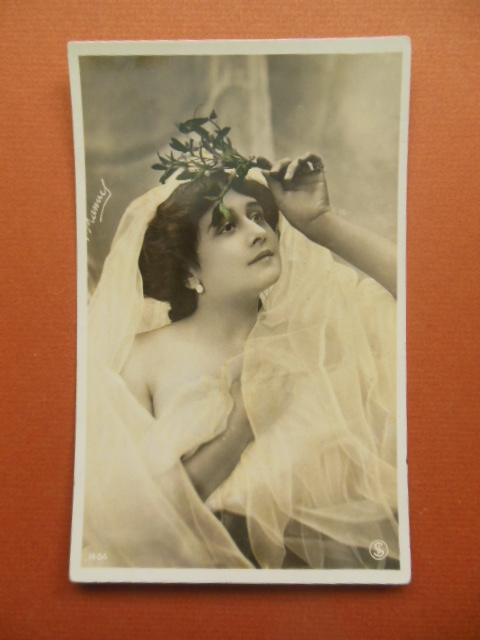 Image for Vintage Postcard Woman Wrapped in a Veil Holding Flowers on Her Head (1404)