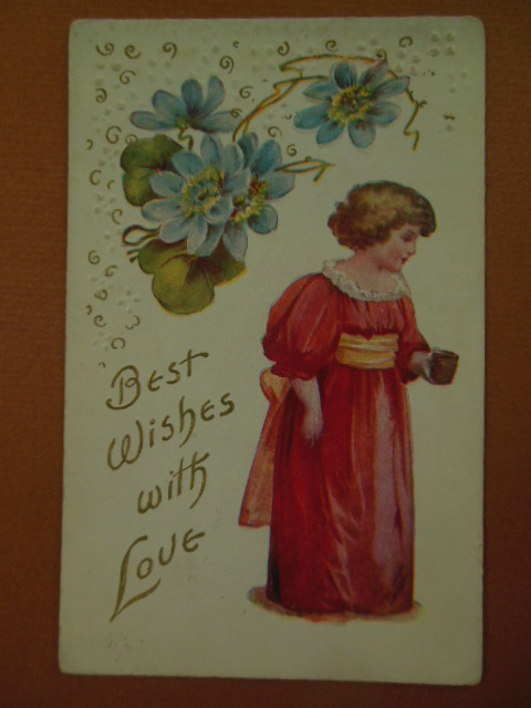 Postcard Best Wishes with Love Little Girl In Pink with Blue Flowers (1909)