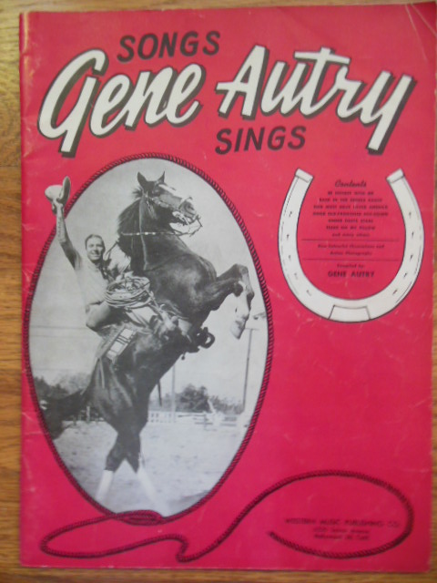 Vintage sheet music cover for 'Songs Gene Autry Sings,' featuring classic Western themes